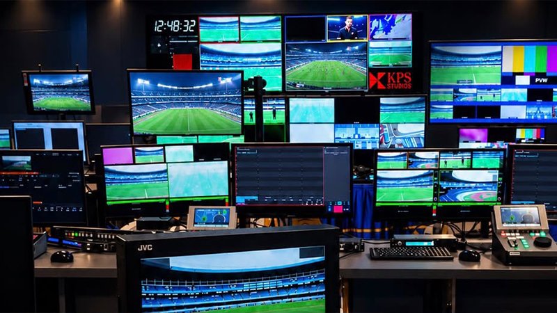 Camera Operator at Sports Event